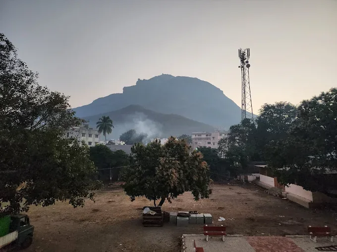 Hazy morning view of Girnar mountain from Narasinha Mehta Dham